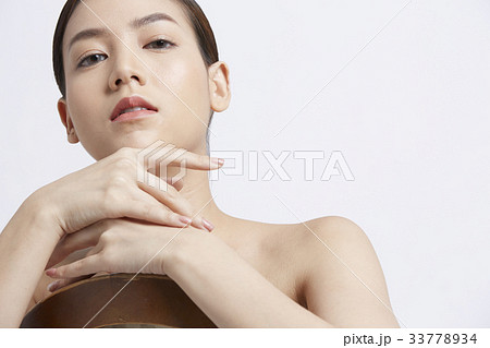 portrait of a beautiful girl posing on white background 33778934