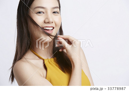photo of smiling girl on white background 33778987