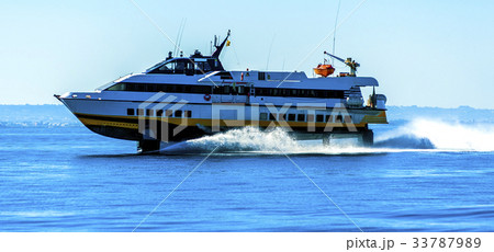hydrofoil boat runs at full speed on the sea waves 33787989