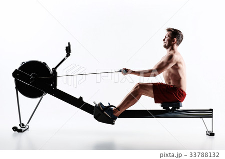 Man Using A Press Machine In A Fitness Club. 33788132