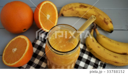 Banana and orange smoothie, energy drink. Banana and orange smoothie, energy drink. 33788152