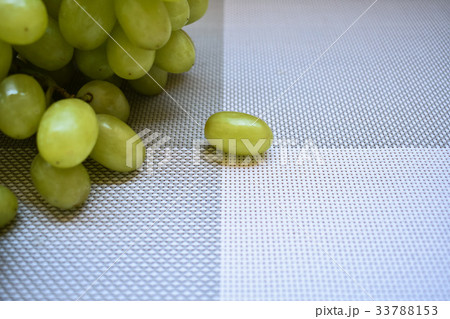 Bunch of grapes on the gray background, copy space 33788153