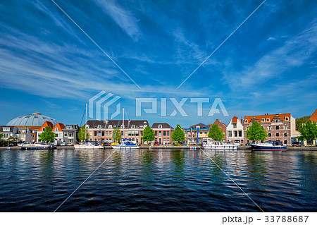 Boats and houses on Spaarne river. Haarlem 33788687