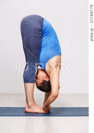 Woman doing Ashtanga Vinyasa yoga asana 33788778