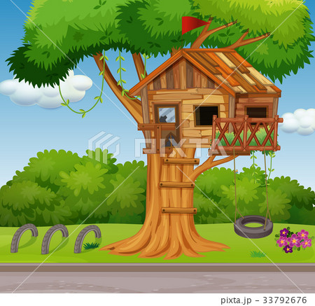 Old treehouse and swing in park 33792676