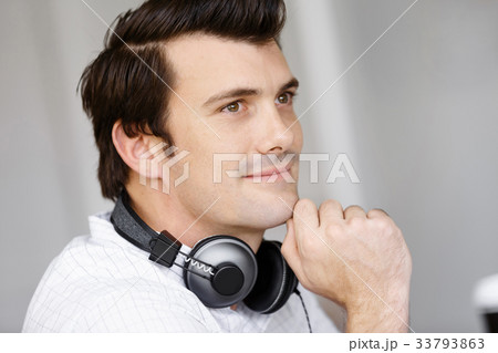 Young man with headphones Young man with headphones 33793863
