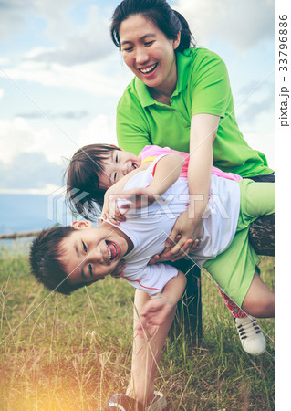 Family with children having fun in nature concept. Family with children having fun in nature concept. 33796886
