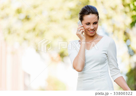 Portrait of business woman smiling outdoor Portrait of business woman smiling outdoor 33800322