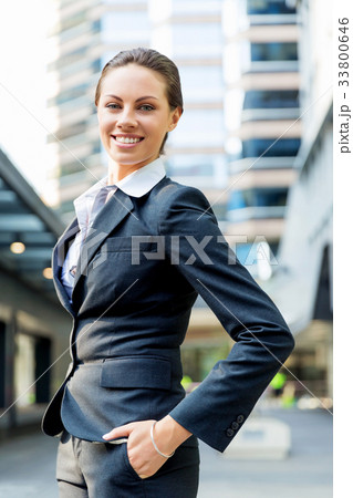 Portrait of business woman smiling outdoor Portrait of business woman smiling outdoor 33800646