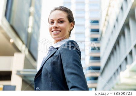 Portrait of business woman smiling outdoor Portrait of business woman smiling outdoor 33800722