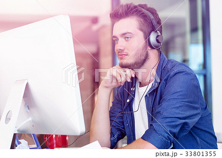 Young man working in office 33801355