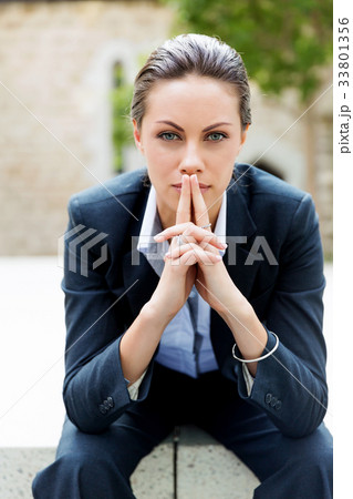 Portrait of business woman smiling outdoor 33801356