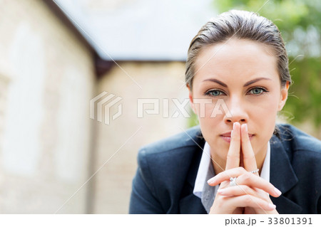 Portrait of business woman smiling outdoor Portrait of business woman smiling outdoor 33801391