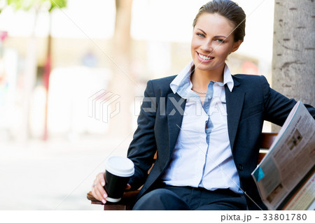 Portrait of business woman smiling outdoor Portrait of business woman smiling outdoor 33801780