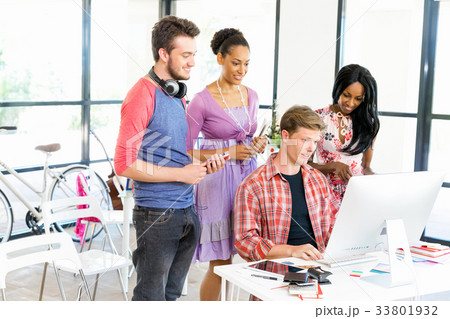 Young office workers as a team Young office workers as a team 33801932