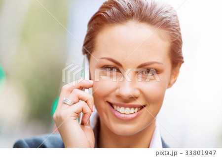 Portrait of business woman smiling outdoor 33801947