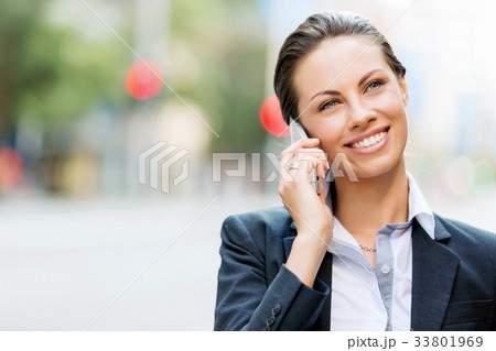 Portrait of business woman smiling outdoor 33801969