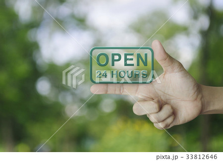 Open 24 hours icon on finger Open 24 hours icon on finger 33812646