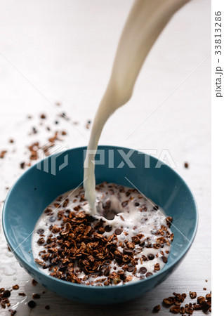 Healthy cereal breakfast. Sweet granola with milk 33813286