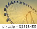Ferris wheel in sunset time (vintage filter) 33818455