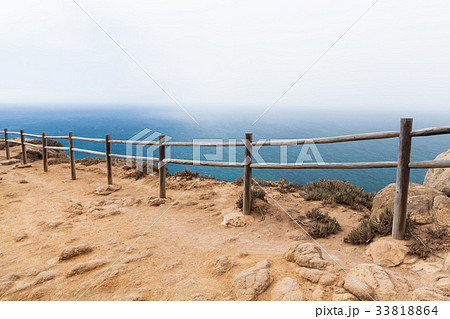 Old wooden railings on the edge of Cabo da Roca 33818864