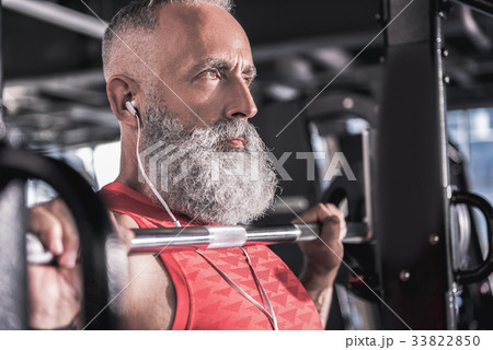 Stylish confident mature male is enjoying sport in Stylish confident mature male is enjoying sport in 33822850