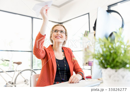 Young woman in office Young woman in office 33826277