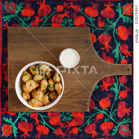 fried dumplings with sour cream 33826842
