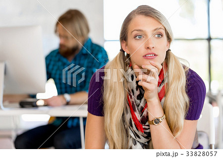 Young woman in office 33828057