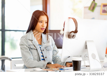 Young woman in office 33829337