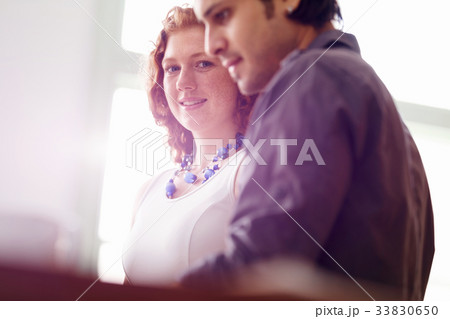 Two young people in office 33830650