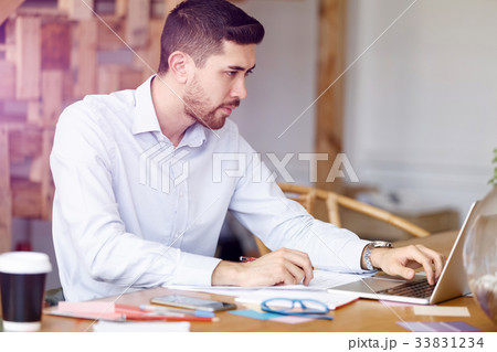 Young man in offfice 33831234