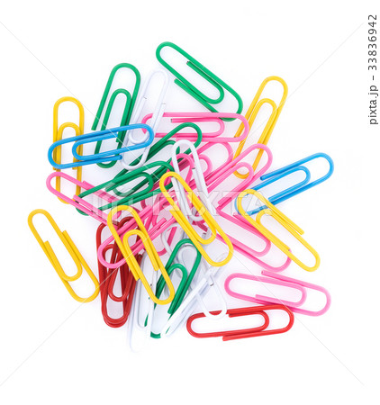 Colored paper clips on white background 33836942