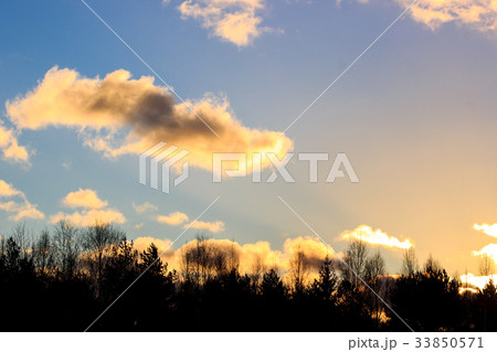 Sunset with gold clouds 33850571