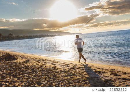 Man jogging outdoors Man jogging outdoors 33852812