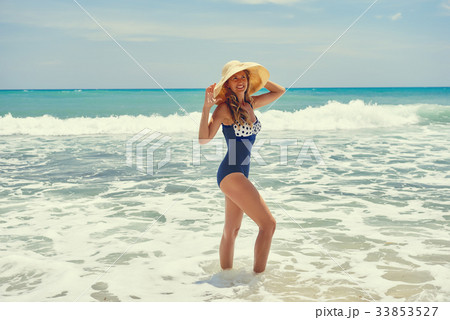 Woman on the beach 33853527
