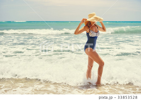 Woman on the beach 33853528