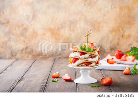 Small cake made of pancakes 33855135