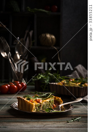 Slice of delicious homemade quiche Slice of delicious homemade quiche 33855211