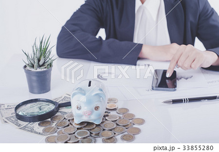 banker calculating balance. finances investment banker calculating balance. finances investment 33855280