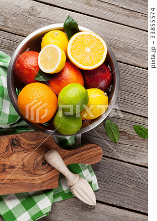 Fresh citrus fruits in colander 33855574