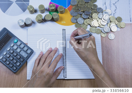 Businessman process with stack coins. Businessman process with stack coins. 33856610