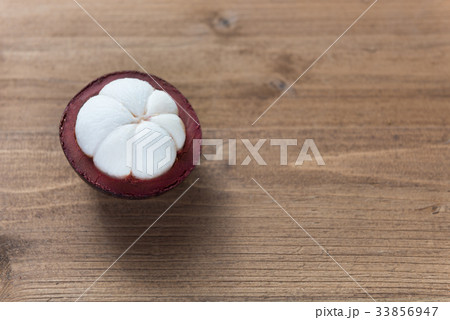 Fresh Mangosteen fruit on wood table  33856947