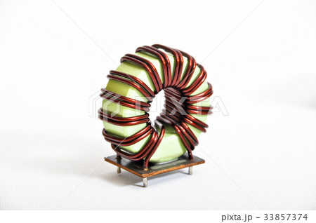 Transformer copper coil isolated white background 33857374