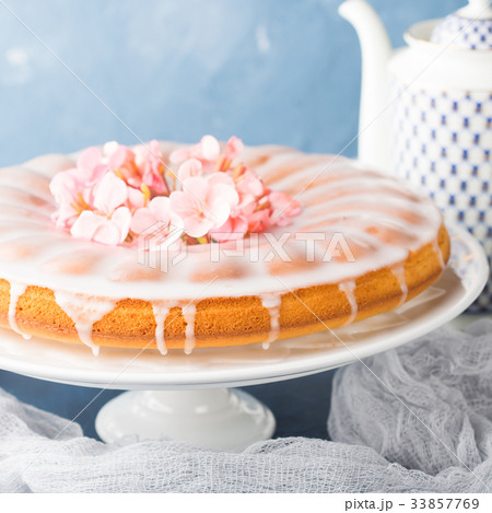 Bundt cake with frosting. Festive treat flowers 33857769