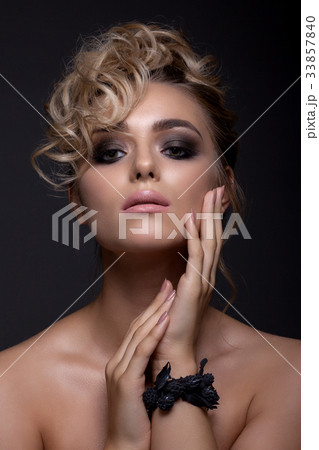 Portrait of a beautiful girl with a contrasting image. 33857840