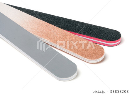 Three nail file with a different abrasive isolated 33858208