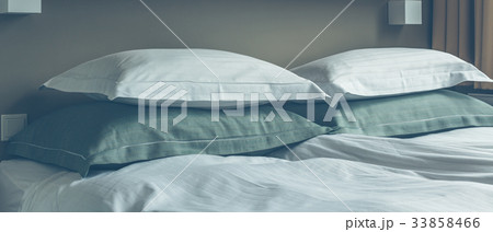 Prepared fresh bed, scene in hotel room Prepared fresh bed, scene in hotel room 33858466