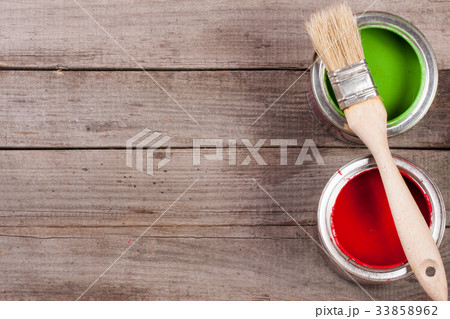 green and red paint in the bank with brush on the 33858962