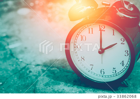 vintage clock selective focus at number 2 o'clock 33862068